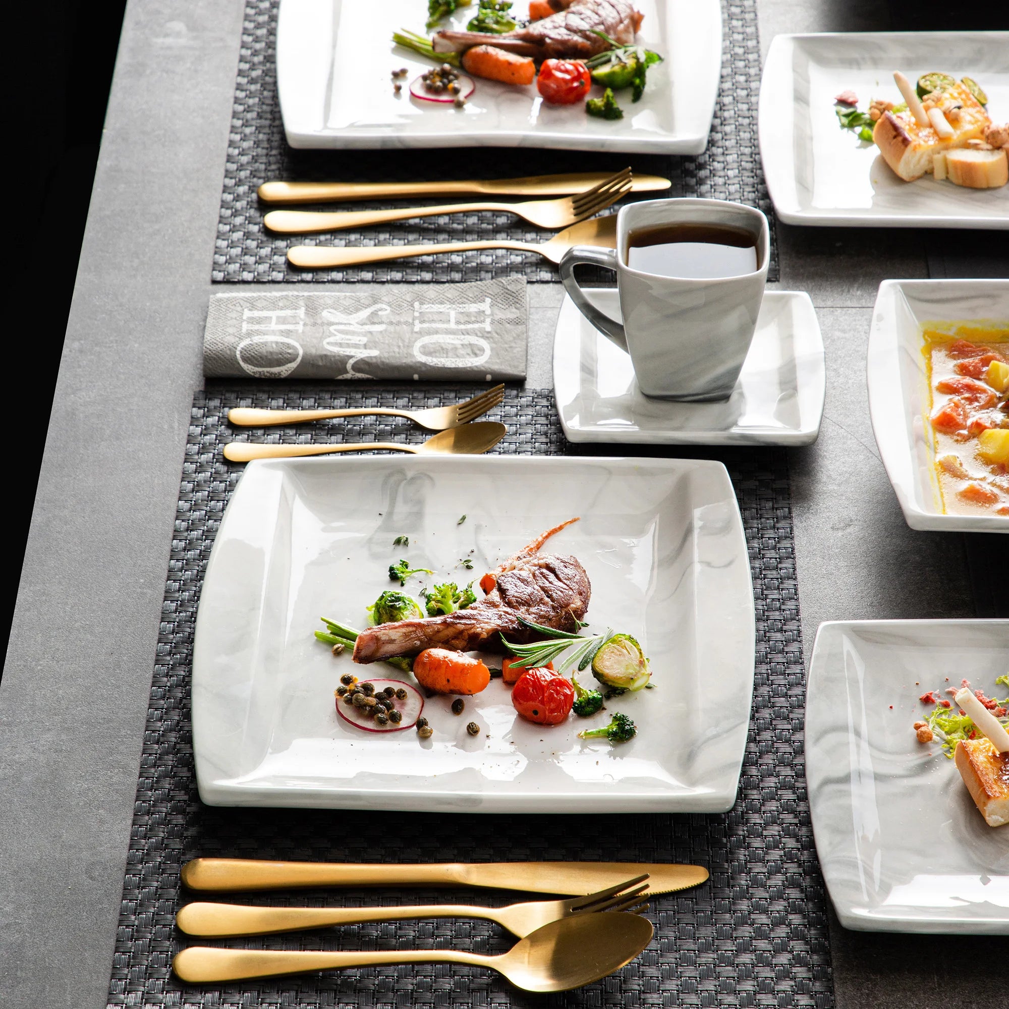 Marmergrijze porseleinen serviesset – servies voor 12 personen met kopjes, schoteltjes, dessertborden, soepborden en dinerborden.